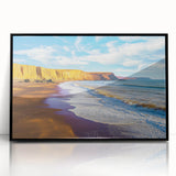 Framed acrylic landscape artwork showcasing dramatic cliffs in vibrant colors, presented in a sleek black frame, ideal for enhancing modern home decor aesthetics.