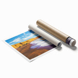Stunning rolled print of a vibrant landscape featuring dramatic cliffs and a rich blue sky, ideal for home decor or art enthusiasts, packaged securely in a tube.