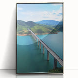 Framed acrylic artwork of a landscape bridge, showcasing a silver finish and intricate details. Ideal for enhancing modern home decor with a touch of elegance.