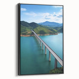 Framed canvas art depicting a beautiful landscape bridge scene, showcasing intricate details and vibrant colors, set against a black frame for an elegant touch. Ideal for home decor enthusiasts seeking nature-inspired artwork.