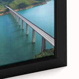 Close-up of a framed canvas depicting a serene landscape bridge scene, showcasing vibrant colors and intricate details, perfect for home decor or office enhancement.