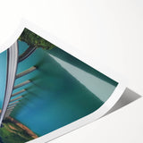 Landscape bridge artwork rolled print showcasing a serene natural scene with lush greenery and a tranquil waterway, securely packaged in a cardboard tube for safe delivery.