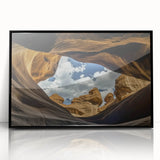 Framed acrylic landscape artwork showcasing vibrant canyons in warm hues, featuring a sleek black frame, perfect for modern home decor and art enthusiasts.