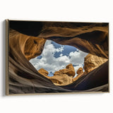 Framed canvas artwork depicting a stunning landscape of canyons, featuring rich gold accents and a side view that highlights its depth, perfect for home decor.