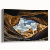 Framed landscape canvas artwork showcasing a stunning view of canyons, featuring a silver frame that enhances the vibrant colors and details of the scene. Ideal for home decor, this piece adds a touch of nature-inspired elegance to any room.