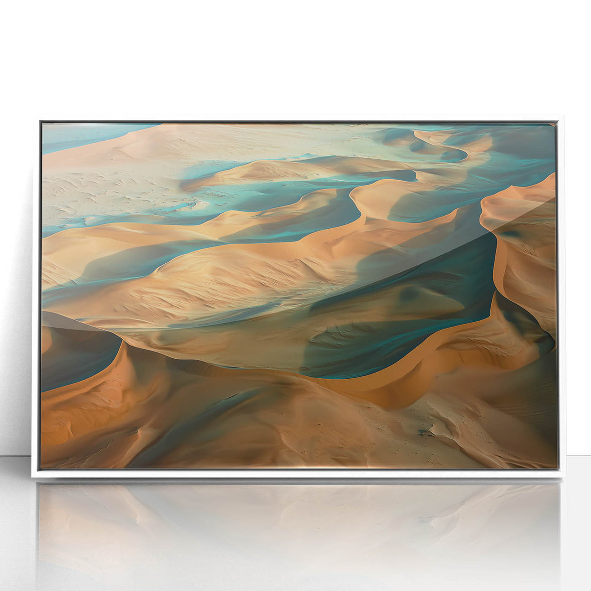 Framed acrylic artwork depicting a serene desert landscape with warm tones of orange and beige, elegantly showcased in a white frame, ideal for home decor.