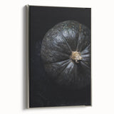 Framed canvas featuring a vintage landscape painting of autumn trees in vibrant orange and red tones.