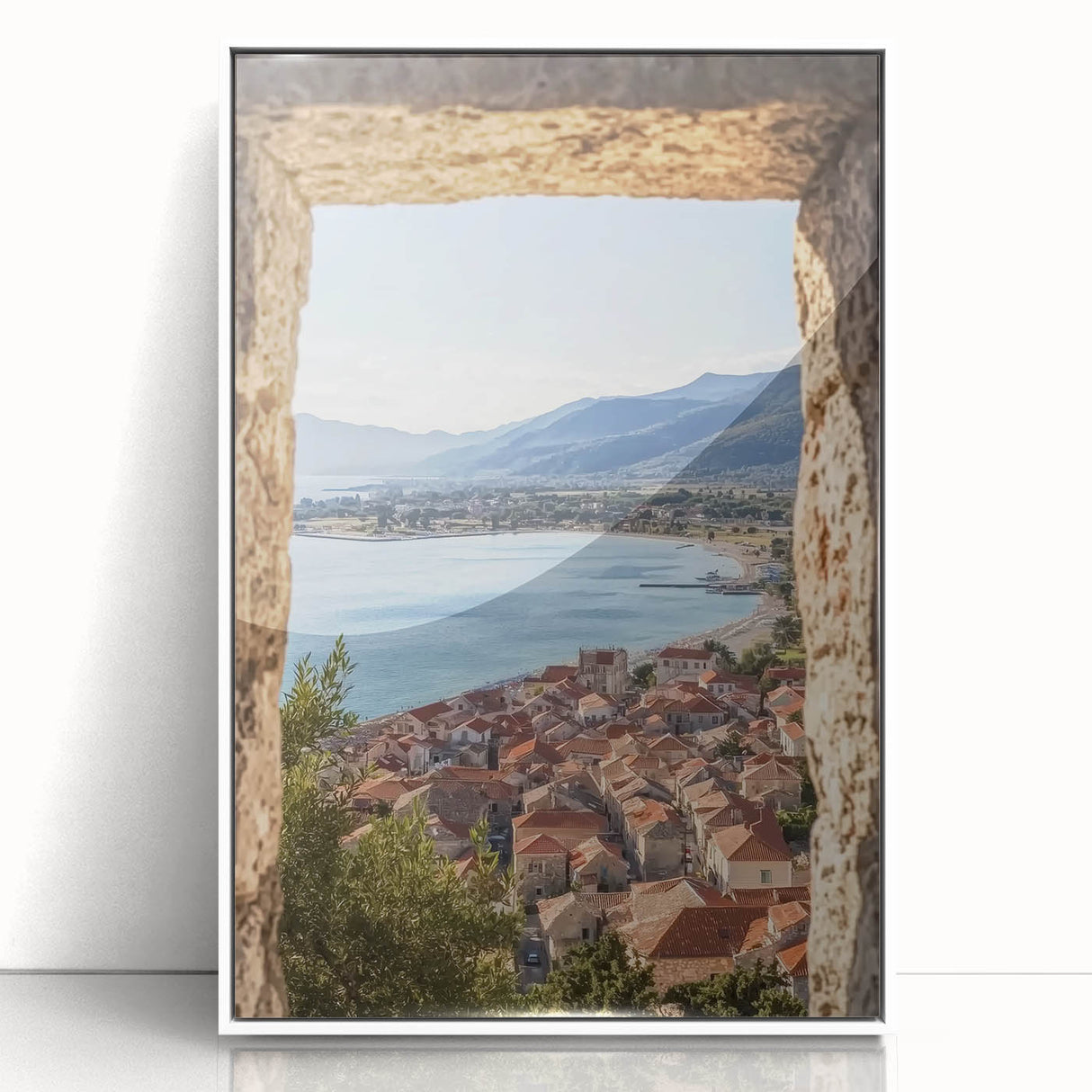 Framed acrylic landscape artwork depicting an enchanting castle surrounded by serene nature, featuring a white frame that enhances its elegance, ideal for home decor.