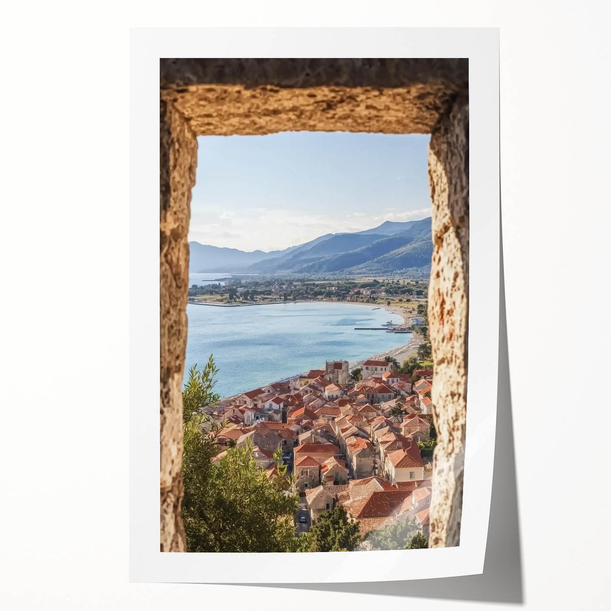 Rolled print showcasing a vibrant landscape of a majestic castle against a serene backdrop, featuring rich colors and intricate details, perfect for home decor.