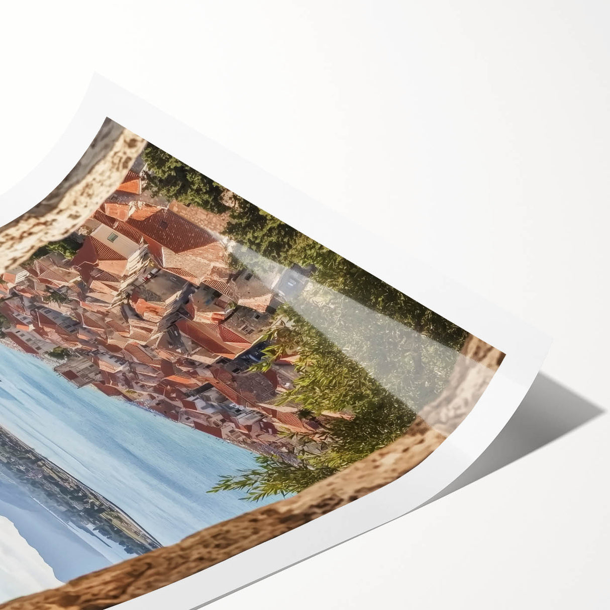 Rolled canvas print showcasing a stunning landscape of a castle set against a vibrant sunset, featuring rich colors and intricate details, perfect for home decor.