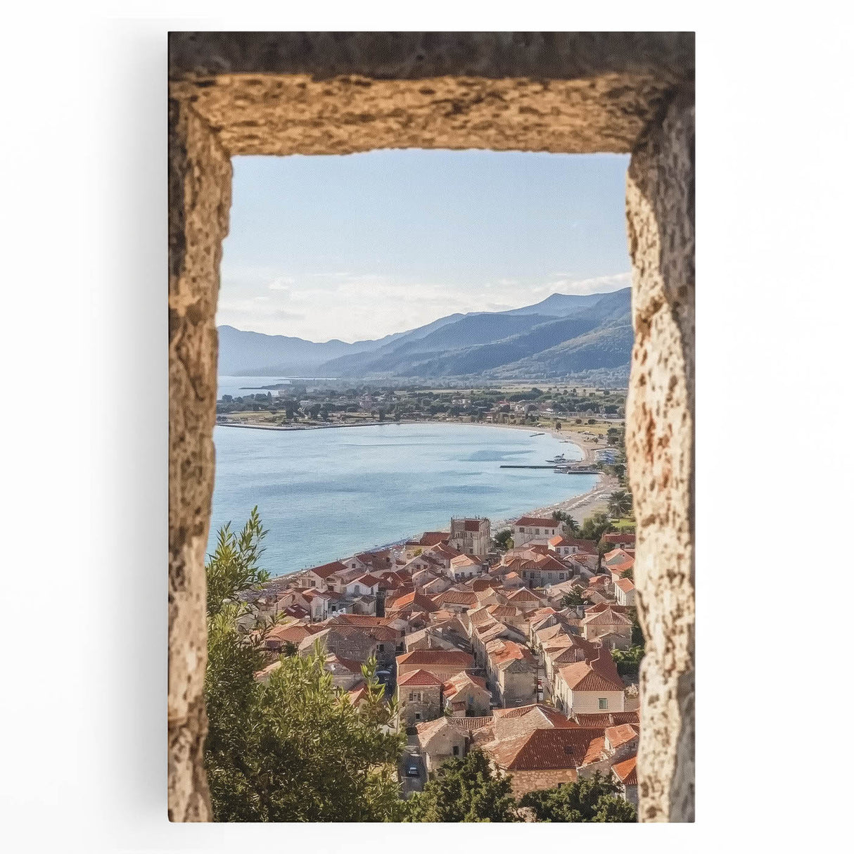 Stretched canvas artwork depicting a serene landscape with a majestic castle, surrounded by lush greenery and a clear blue sky, perfect for home decor.