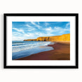 Framed landscape print showcasing dramatic cliffs in a black mat, ideal for home decor, emphasizing natural beauty and serenity in interior spaces.