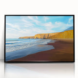 Framed acrylic artwork of a dramatic cliff landscape, featuring bold colors and intricate details, presented in a sleek black frame, ideal for modern home decor.