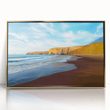 Framed acrylic artwork depicting a stunning coastal landscape with cliffs, vibrant blue ocean waves, and a golden frame, ideal for enhancing modern home decor.