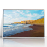 Framed acrylic artwork showcasing a vibrant landscape with towering cliffs and lush greenery, set against a serene blue sky, perfect for enhancing home decor.