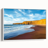 Framed canvas artwork depicting a stunning cliff landscape with vibrant colors, set against a white frame, highlighting natural beauty and depth. Ideal for home decor.