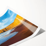 Stunning rolled print of dramatic cliffs in a vibrant landscape, showcasing rich colors and intricate details, perfect for enhancing modern home decor.