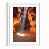 Framed landscape art print showcasing majestic canyons with a white mat, ideal for home decor, emphasizing natural beauty and earthy tones. Perfect for enhancing interior spaces.