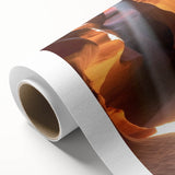 Stunning rolled canvas artwork depicting vibrant canyon landscapes in rich earth tones, designed to enhance any wall decor and packaged securely for delivery.