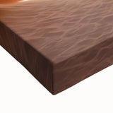 Close-up of a stretched canvas artwork depicting vibrant, abstract canyons in warm earth tones, ideal for home decor and art enthusiasts seeking unique landscape designs.