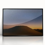 Framed acrylic artwork showcasing a striking desert landscape with vibrant colors, set in a sleek black frame, ideal for modern decor. Perfect for adding a touch of nature to any room.