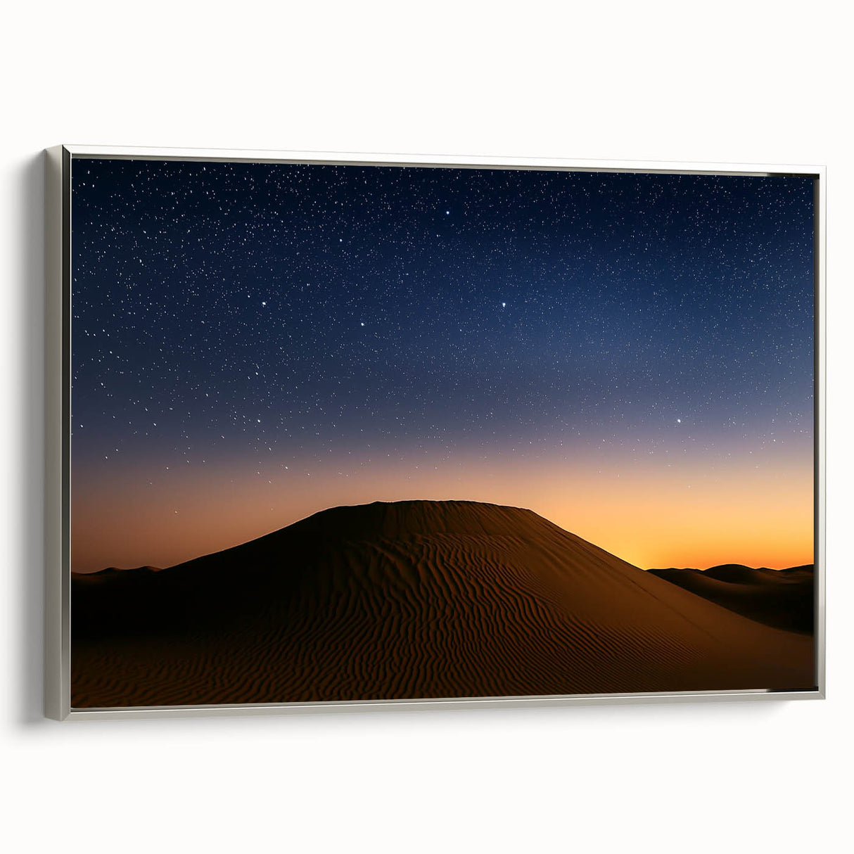 Framed canvas artwork depicting a desert landscape with vibrant colors, showcased from a silver side view, perfect for enhancing modern home decor.