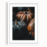 Abstract art print featuring swirling autumnal hues on a white framed canvas, ideal for dining room decor.