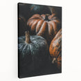 Side view of a large stretched canvas featuring a fall-themed abstract design in warm orange and brown tones.