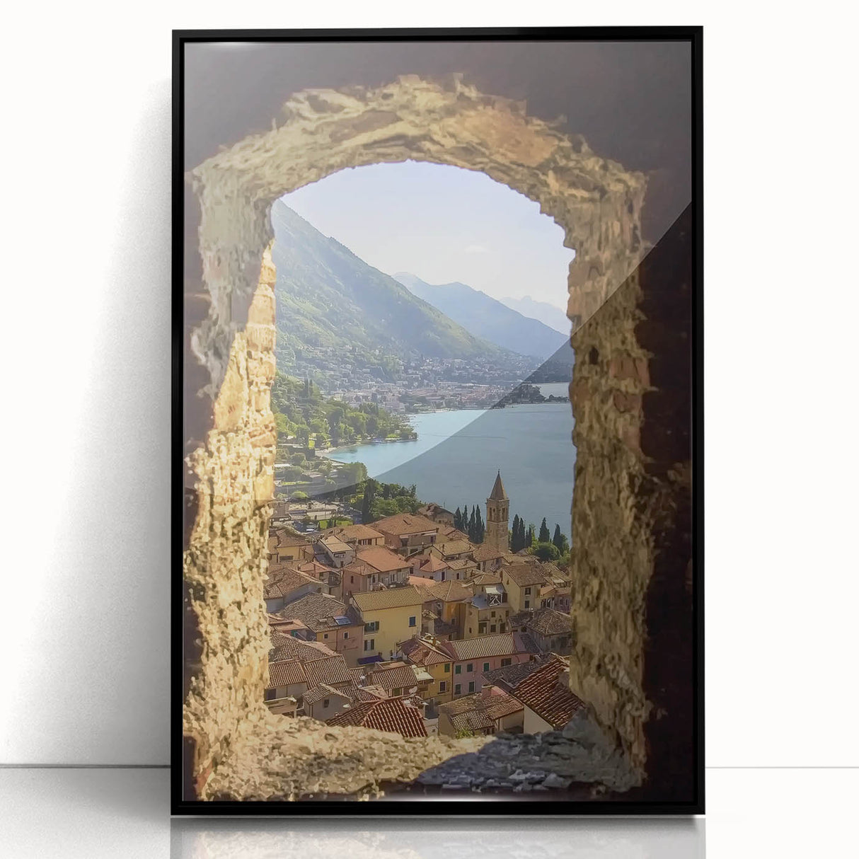Framed acrylic artwork showcasing a stunning landscape with a castle, featuring a sleek black frame and vibrant colors, ideal for enhancing home decor.