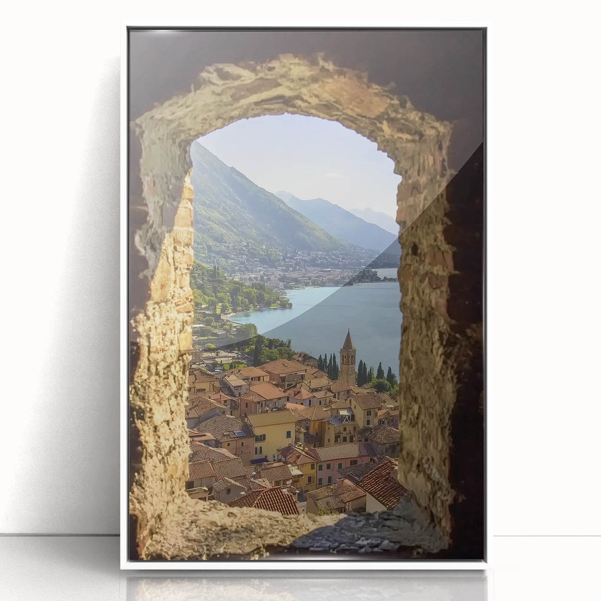 Framed acrylic wall art depicting a picturesque landscape with a castle, featuring a white border and vibrant colors, ideal for home decor enthusiasts.