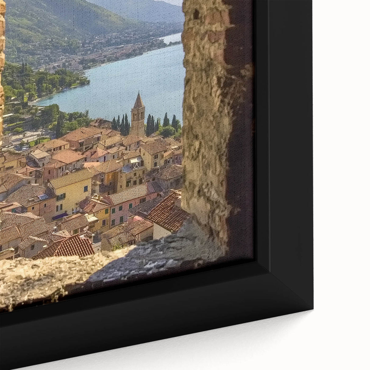 Close-up of a framed landscape canvas depicting a majestic castle surrounded by lush greenery, showcasing intricate details and vibrant colors, ideal for home decor.