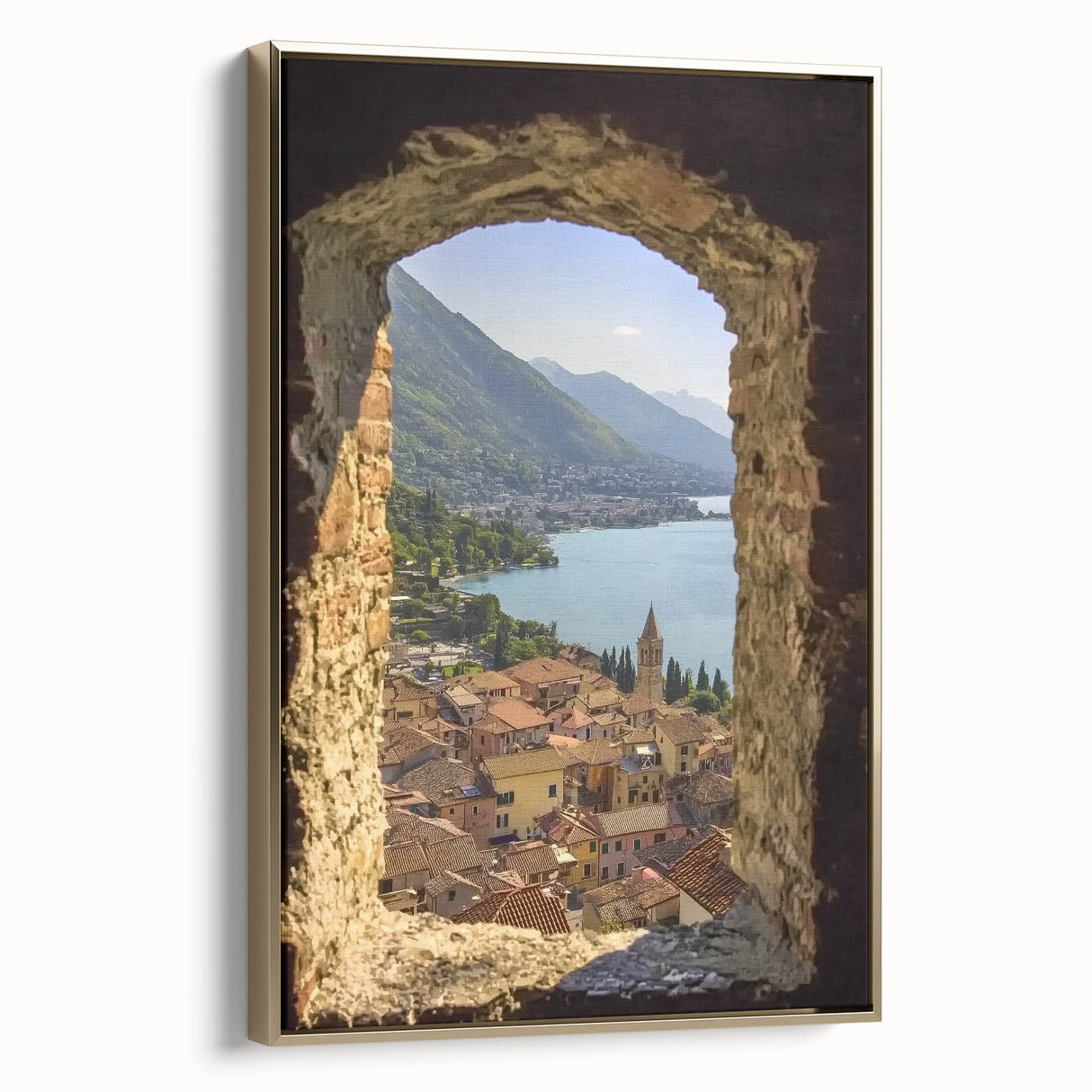 Framed canvas artwork showcasing a picturesque landscape with a majestic castle, accented by a gold frame, ideal for home decor and enhancing interior aesthetics.