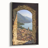 Framed canvas artwork depicting a serene landscape with a majestic castle, set against a twilight sky. The piece features a silver frame that enhances its elegance, making it a perfect addition to any decor.