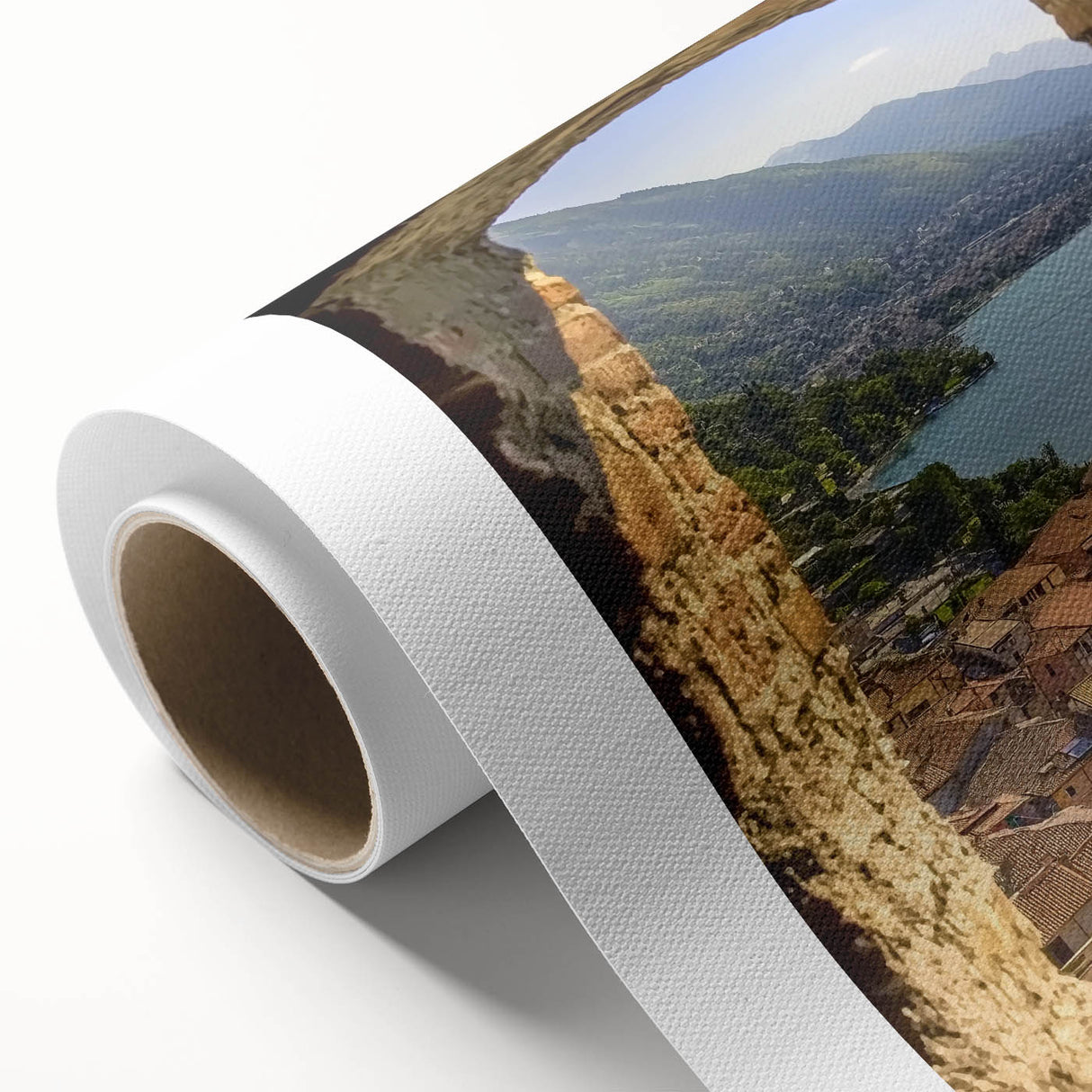 Rolled canvas depicting a vibrant landscape featuring a majestic castle surrounded by lush greenery, housed in a durable cardboard tube for safe transport. The artwork captures enchanting colors and intricate details, perfect for enhancing home decor.
