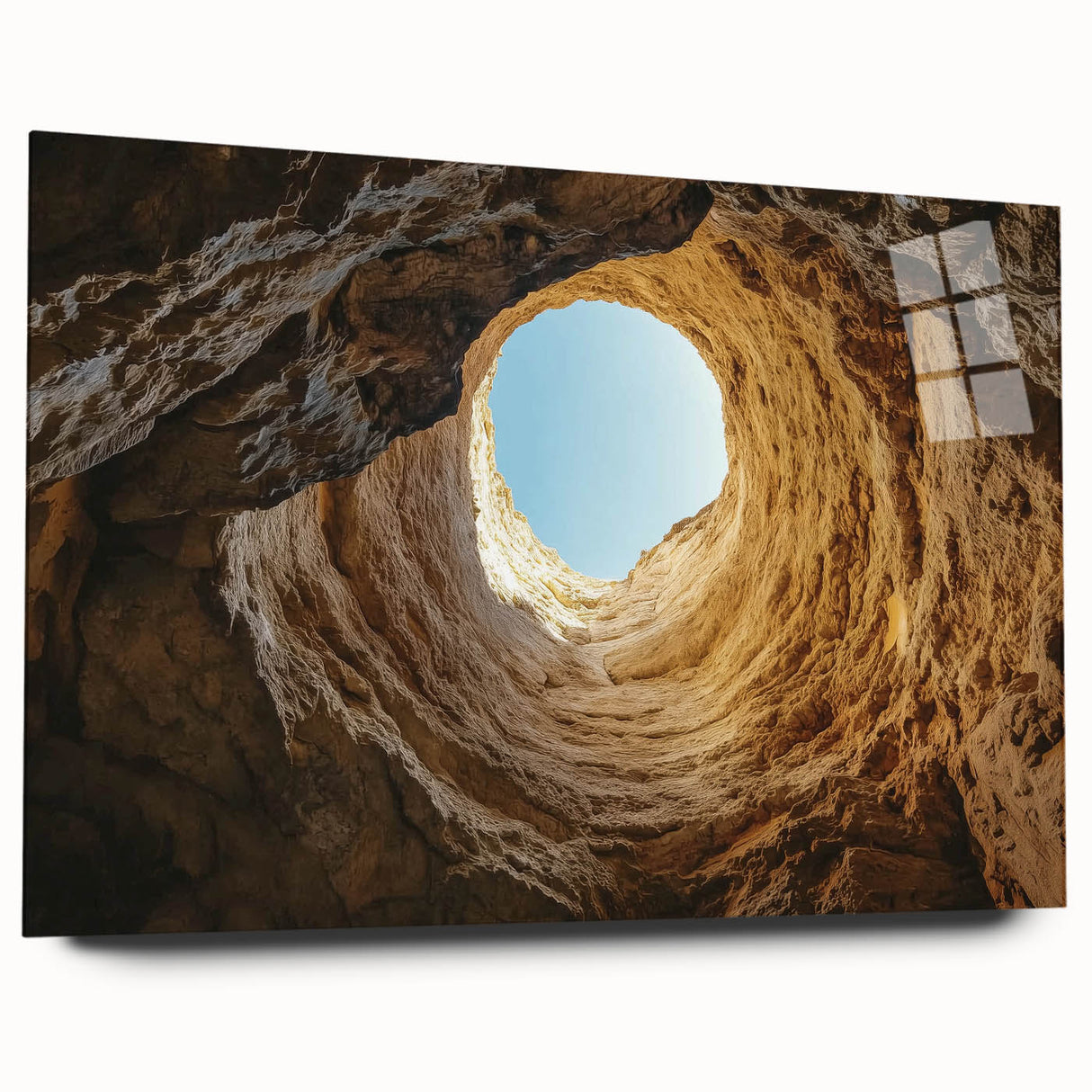 Acrylic glass artwork showcasing a stunning landscape scene with caves, displayed from a side view. The design features vibrant colors and intricate details, perfect for modern decor.