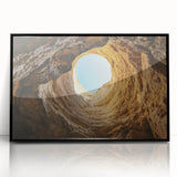 Framed acrylic artwork showcasing a stunning cave landscape in vivid colors, featuring a sleek black frame that enhances the visual appeal, ideal for modern decor.