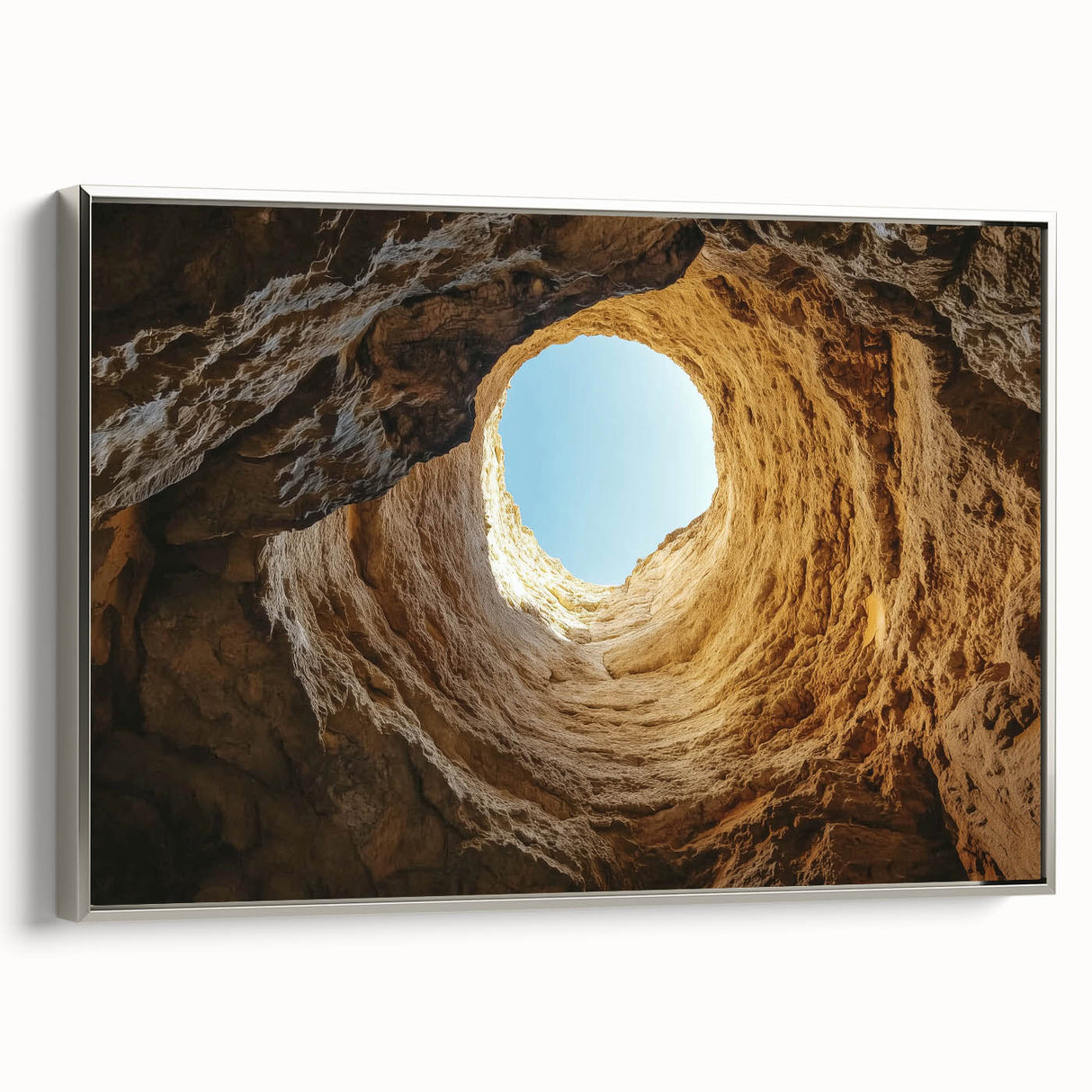 Framed canvas artwork showcasing a stunning silver side view of landscapes and caves, ideal for enhancing modern home decor with a touch of elegance.