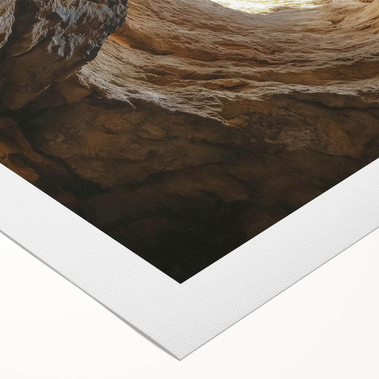 Rolled canvas artwork depicting a vibrant landscape with intricate cave designs, showcasing earthy tones and textures, ideal for home decor. Packaged securely in a protective tube for safe delivery.
