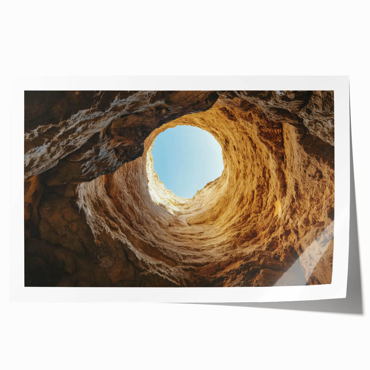 Rolled print showcasing a stunning landscape design of caves with intricate details and vibrant colors, perfect for home decor or office artwork.