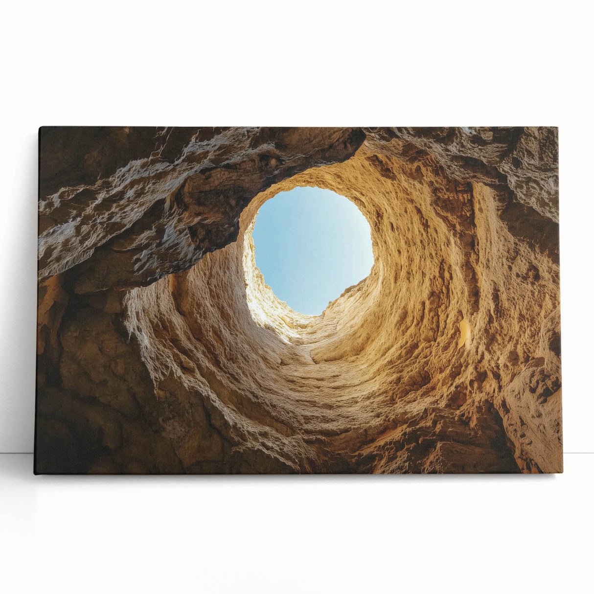 Stretched canvas artwork depicting a serene landscape with dramatic caves and vibrant colors, ideal for home decor or office settings, showcasing nature's beauty.