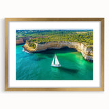 Elegant gold-framed landscape print featuring dramatic cliffs, set against a serene sky, perfect for enhancing home decor with natural beauty. Ideal for art lovers.