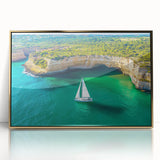 Framed acrylic landscape artwork depicting dramatic cliffs bathed in golden hues, showcasing intricate details and vibrant colors, perfect for home decor.