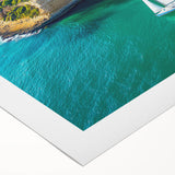 Vibrant rolled canvas depicting a stunning landscape with dramatic cliffs and a clear blue sky, ideal for enhancing home decor or art collections, packaged securely in a cardboard tube.