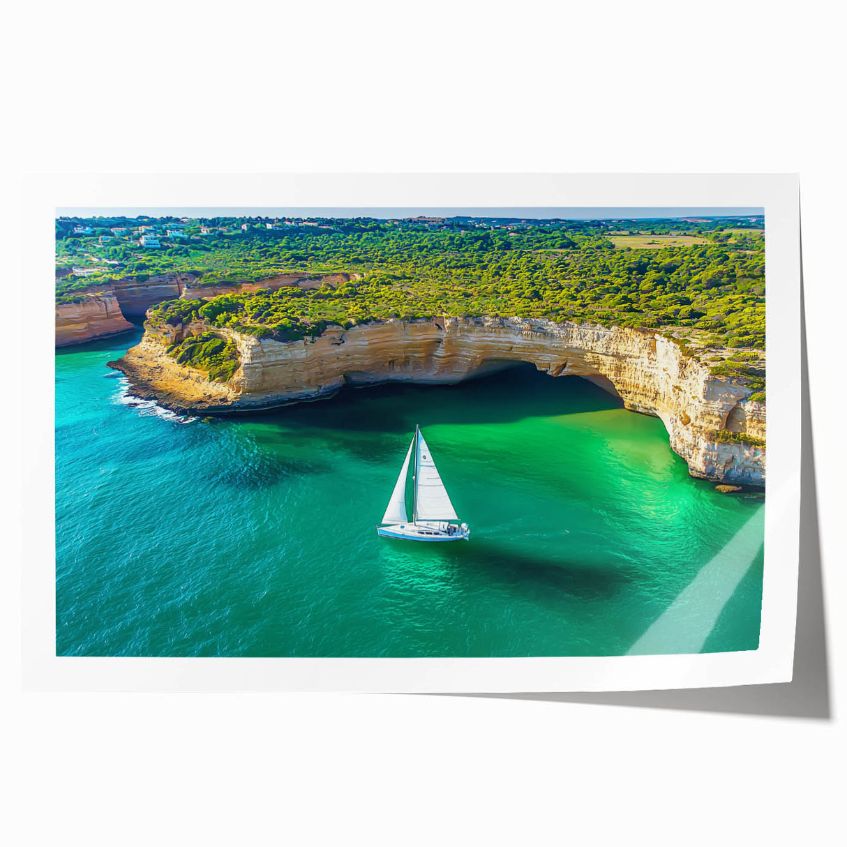 Vibrant rolled print of a dramatic cliff landscape, showcasing rich colors and intricate details, packaged securely in a protective cardboard tube for easy transport.
