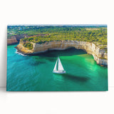 Stretched canvas art print showcasing a dramatic landscape of towering cliffs against a vibrant sunset, perfect for adding a touch of nature to any room decor.