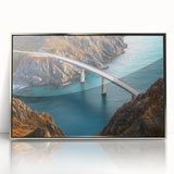 Framed acrylic artwork of a landscape bridge, showcasing a serene river scene with lush greenery and a clear blue sky, perfect for modern home decor.