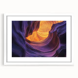 Framed landscape artwork depicting vibrant canyons in rich colors, set in a sleek white mat, ideal for home decor and art enthusiasts.