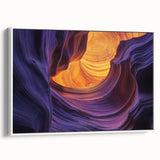 Framed landscape canvas artwork showcasing vibrant canyons in warm earth tones, elegantly displayed with a white border, perfect for enhancing home decor.