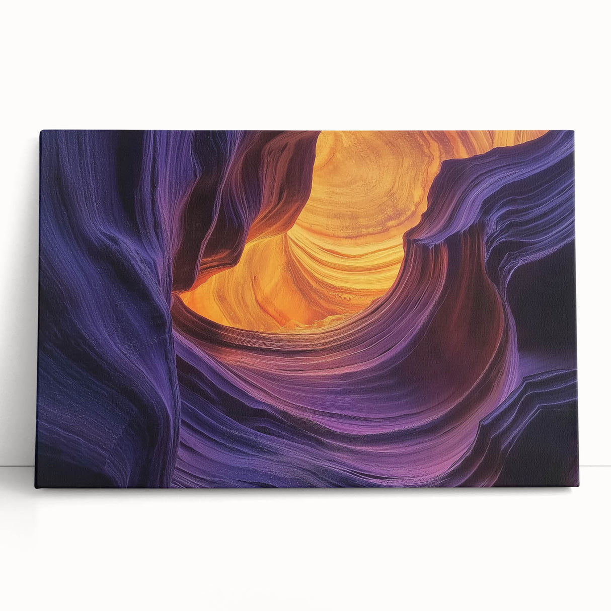 Stretched canvas artwork depicting a vibrant landscape of canyons at sunset, showcasing rich orange and purple hues, perfect for home decor and nature lovers.