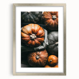 Textured abstract art print in earth tones, framed in silver, ideal for bedroom decor.